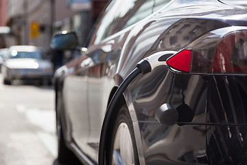 Image showing Electric Car in Charging Station.