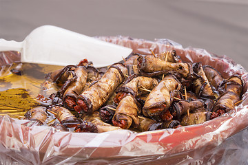 Image showing Marinated aubergine stuffed with red pepper