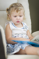 Image showing Blonde Haired Blue Eyed Little Girl Reading Her Book