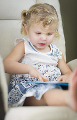 Image showing Blonde Haired Blue Eyed Little Girl Reading Her Book