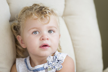 Image showing Adorable Blonde Haired and Blue Eyed Little Girl in Chair