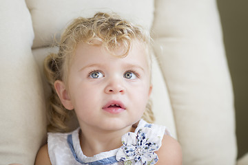 Image showing Adorable Blonde Haired and Blue Eyed Little Girl in Chair