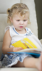 Image showing Blonde Haired Blue Eyed Little Girl Reading Her Book