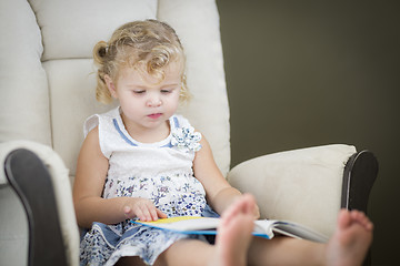 Image showing Blonde Haired Blue Eyed Little Girl Reading Her Book