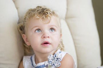 Image showing Adorable Blonde Haired and Blue Eyed Little Girl in Chair