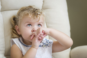 Image showing Adorable Blonde Haired and Blue Eyed Little Girl in Chair