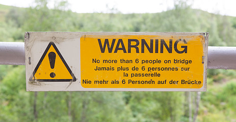Image showing Warning sign at a bridge