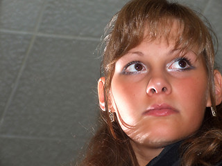Image showing Portrait of the young beautiful girl looking sideways