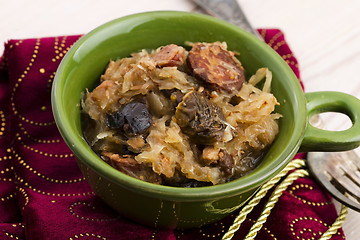 Image showing traditional polish sauerkraut (bigos) with mushrooms and plums