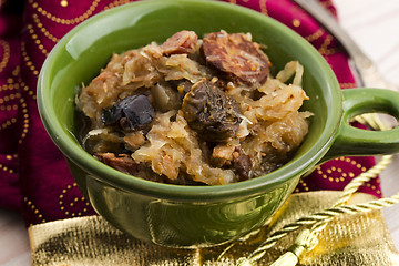 Image showing traditional polish sauerkraut (bigos) with mushrooms and plums