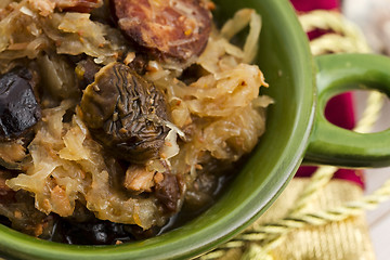 Image showing traditional polish sauerkraut (bigos) with mushrooms and plums