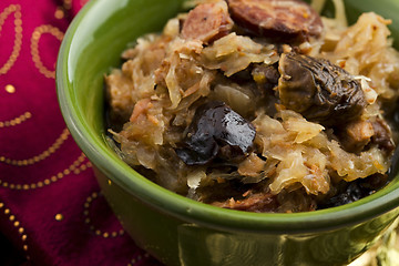 Image showing traditional polish sauerkraut (bigos) with mushrooms and plums