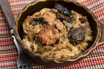 Image showing traditional polish sauerkraut (bigos) with mushrooms and plums