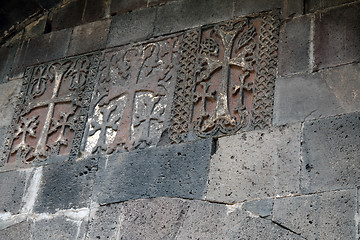 Image showing Carved crosses in a row on the wall of Geghard monastery