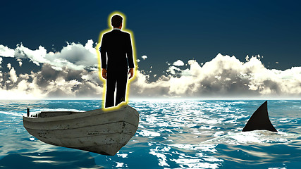 Image showing Businessman on boat & shark