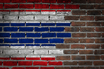 Image showing Brick wall texture with flag