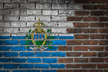 Image showing Brick wall texture with flag