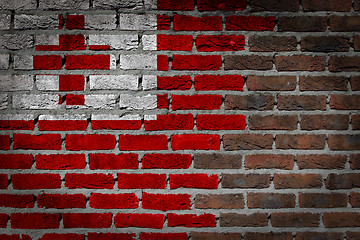 Image showing Brick wall texture with flag