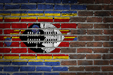 Image showing Brick wall texture with flag