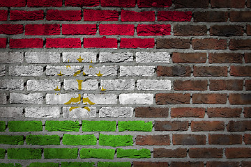 Image showing Brick wall texture with flag