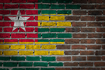 Image showing Brick wall texture with flag