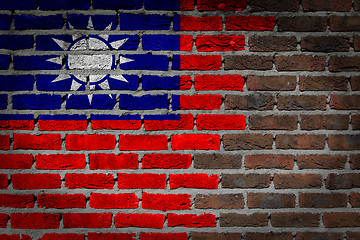 Image showing Brick wall texture with flag