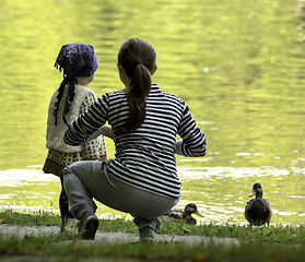 Image showing Young mother with a child