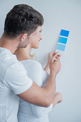 Image showing Caucasian Couple Looking at Color Indicator Paper