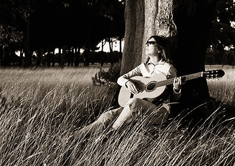 Image showing Playing guitar