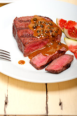 Image showing green peppercorn beef filet mignon