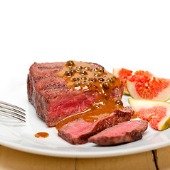 Image showing green peppercorn beef filet mignon