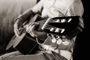 Image showing Playing guitar