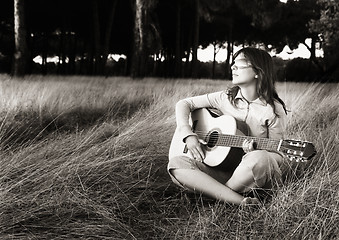 Image showing Playing guitar