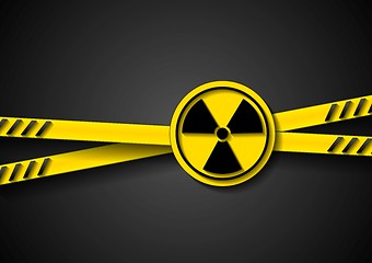 Image showing Danger tape abstract background with radiation symbol