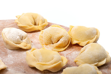 Image showing Homemade ravioli on kitchen wooden board