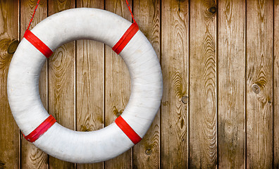 Image showing Lifebuoy on a wooden wall