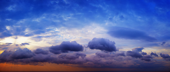 Image showing Panorama of beautiful cloudy sky with sunshine over the sea hori