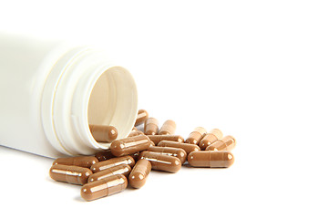 Image showing brown pills isolated