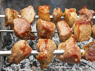 Image showing Shish kebab on metal skewers