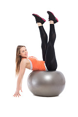 Image showing Young woman doing exercises
