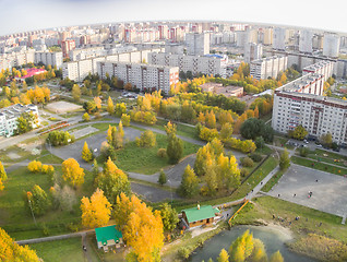 Image showing Aerial view on park with little church. Tyumen