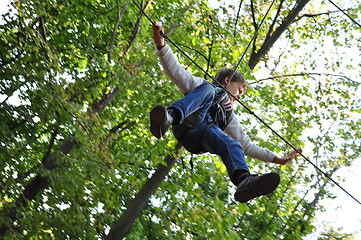 Image showing child in a climbing adventure activity park