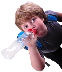 Image showing closeup portrait of kid drinking water
