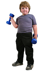Image showing isolated portrait of elementary age boy with dumbbells exercising 