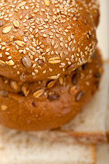 Image showing organic bread over rustic table