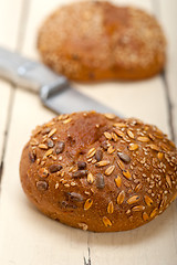 Image showing organic bread over rustic table