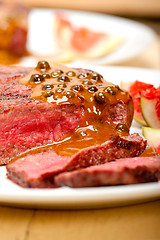 Image showing green peppercorn beef filet mignon