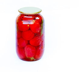 Image showing Canned tomatoes in a large glass jar on white background