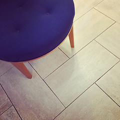 Image showing Blue stool on tile floor