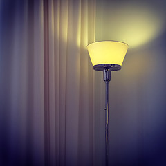 Image showing Modern lamp in a dark room